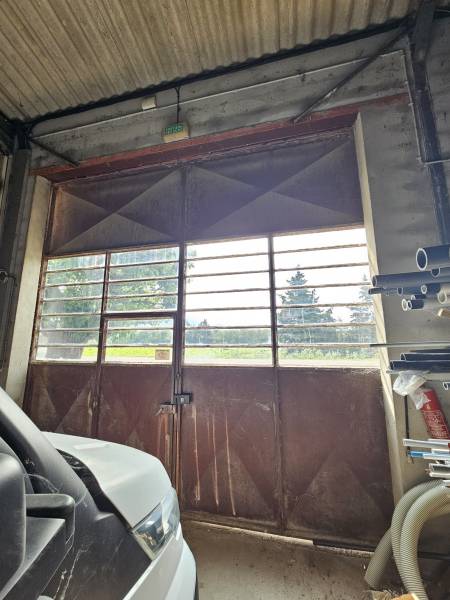 Remplacement porte acier coulissante par porte sectionnelle