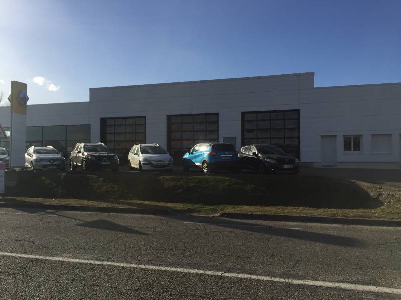 Pose de porte sectionnelle industrielle dans la Drome